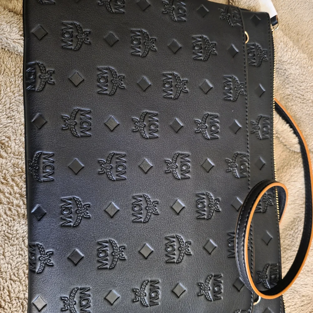 MCM Black Embossed Men's Bag